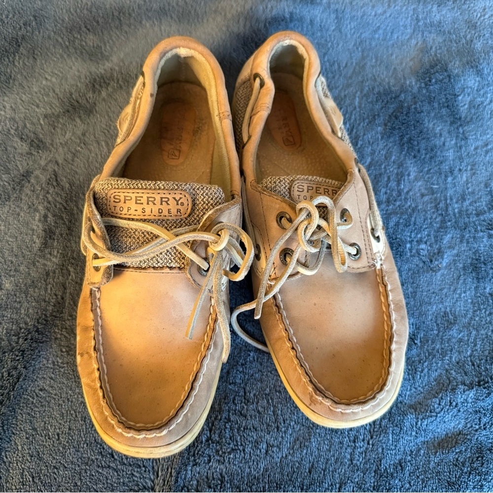 Used beige Sperry pair of slippers size 7.5M women
